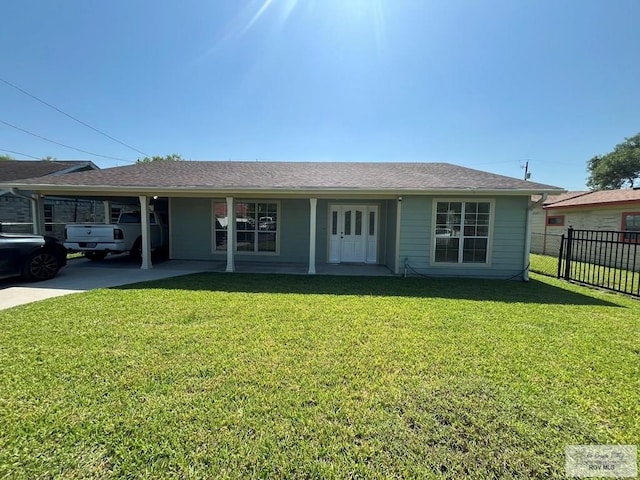 ranch-style home with a front lawn and a carport