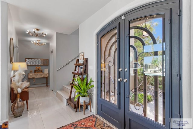 tiled entryway with french doors