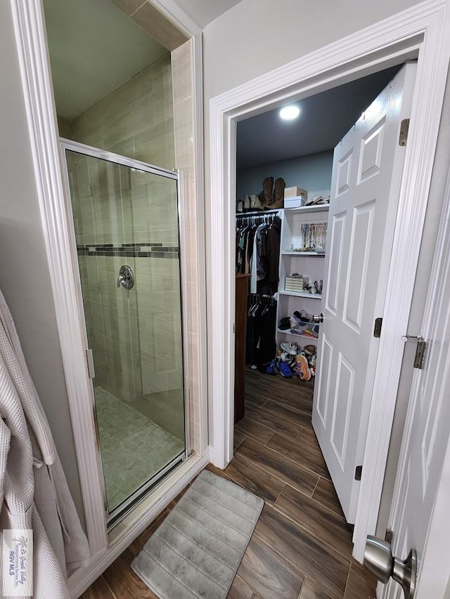 bathroom with an enclosed shower