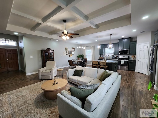 living room with coffered ceiling, dark wood-type flooring, and beamed ceiling