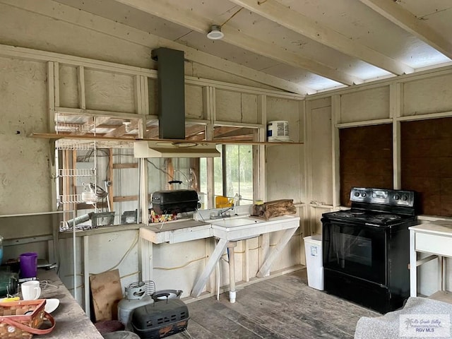 kitchen with hardwood / wood-style floors, lofted ceiling, cream cabinets, and black / electric stove