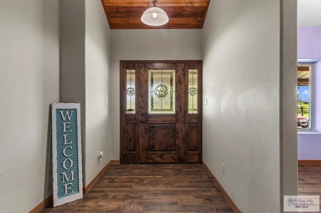 25096 Rabb Rd, La Feria, TX 78559 - foyer featuring dark wood finished floors, wooden ceiling, and lofted ceiling