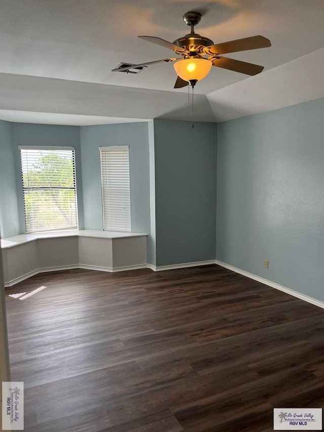 901 Morelos Ave, Rancho Viejo, TX 78575 - unfurnished room featuring ceiling fan and wood finished floors