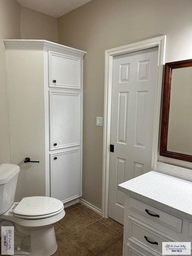 901 Morelos Ave, Rancho Viejo, TX 78575 - half bath featuring vanity and tile patterned floors