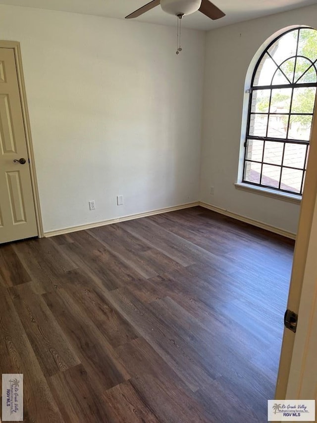 901 Morelos Ave, Rancho Viejo, TX 78575 - unfurnished room with ceiling fan and dark wood-style floors