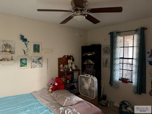 bedroom featuring a ceiling fan