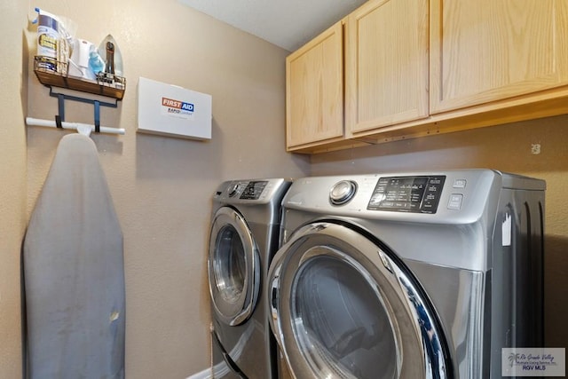 313 Scarlett Cir, Harlingen, TX 78552 - laundry area featuring cabinet space and washer and dryer