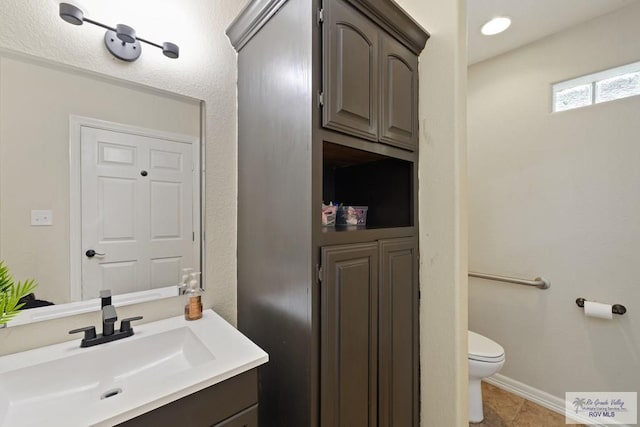 313 Scarlett Cir, Harlingen, TX 78552 - bathroom with vanity and tile patterned flooring