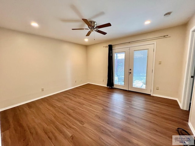40 Cherokee Ave, Harlingen, TX 78552 - unfurnished room with french doors, wood finished floors, a ceiling fan, a smoke detector, and recessed lighting