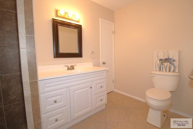 40 Cherokee Ave, Harlingen, TX 78552 - bathroom with vanity and tile patterned flooring