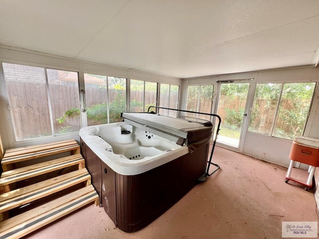 40 Cherokee Ave, Harlingen, TX 78552 - sunroom featuring a jacuzzi and healthy amount of natural light