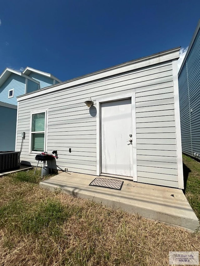 entrance to property with central air condition unit