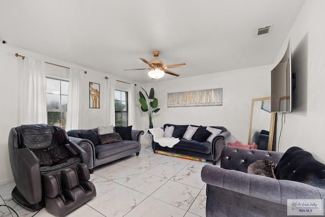 living room featuring ceiling fan