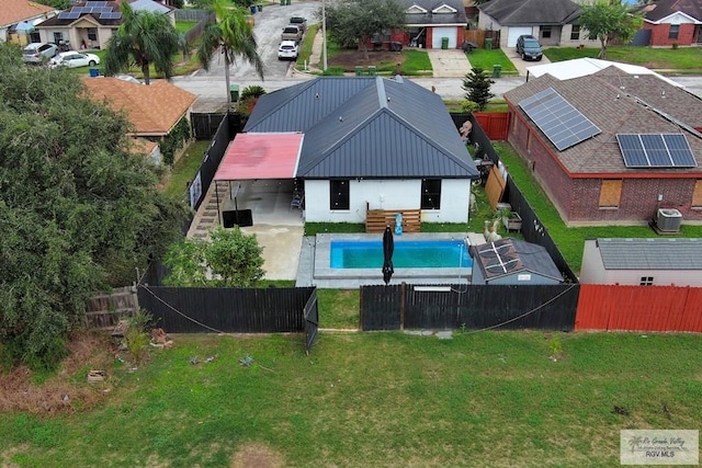 view of pool with central AC unit