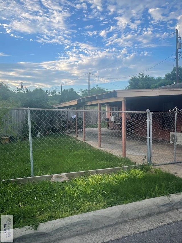 view of yard with a carport