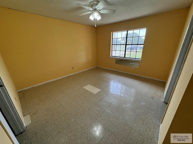 spare room featuring ceiling fan