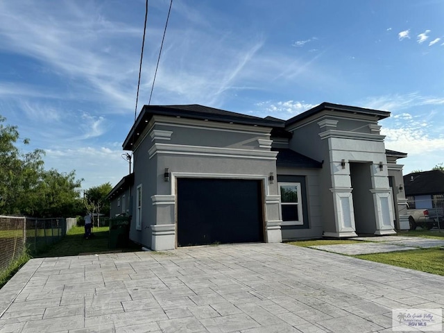 view of front of house with a garage