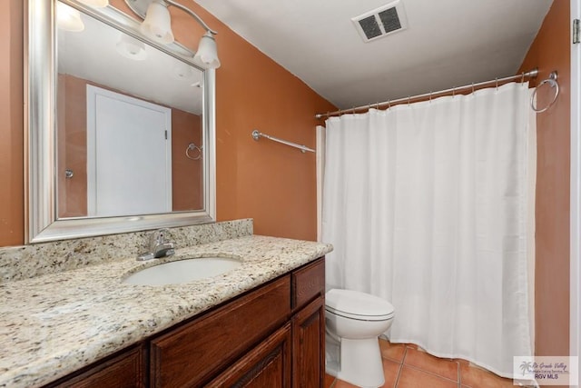 1302 Harbor Island Dr, Port Isabel, TX 78526 - full bath with vanity, tile patterned flooring, and a shower with shower curtain