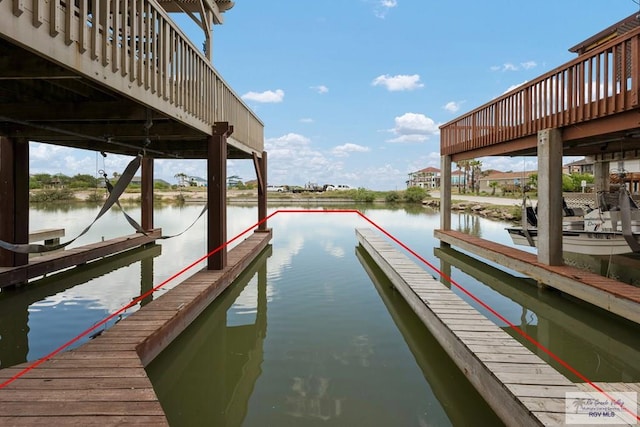 1302 Harbor Island Dr, Port Isabel, TX 78526 - dock area featuring a water view and boat lift