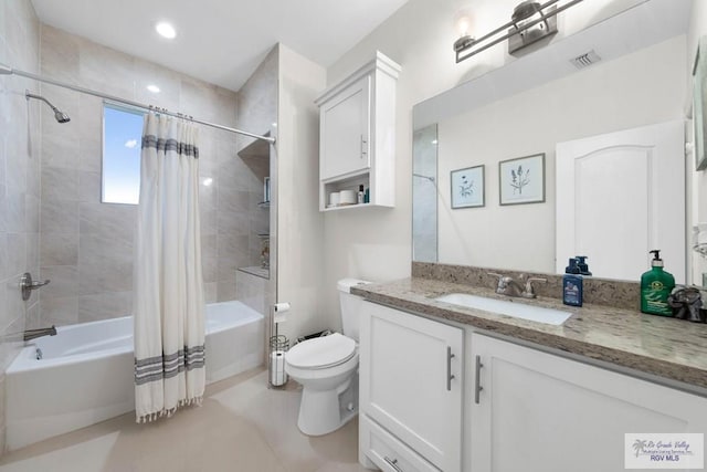 full bathroom featuring tile patterned floors, visible vents, toilet, shower / bath combination with curtain, and vanity