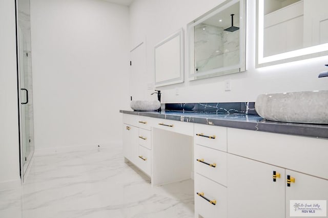 interior space with sink and white cabinets