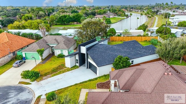 drone / aerial view featuring a water view