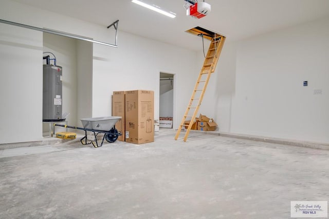 garage with a garage door opener and water heater