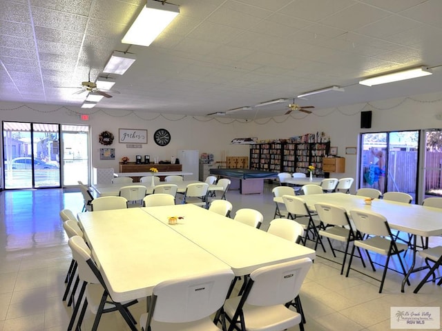 dining area with ceiling fan