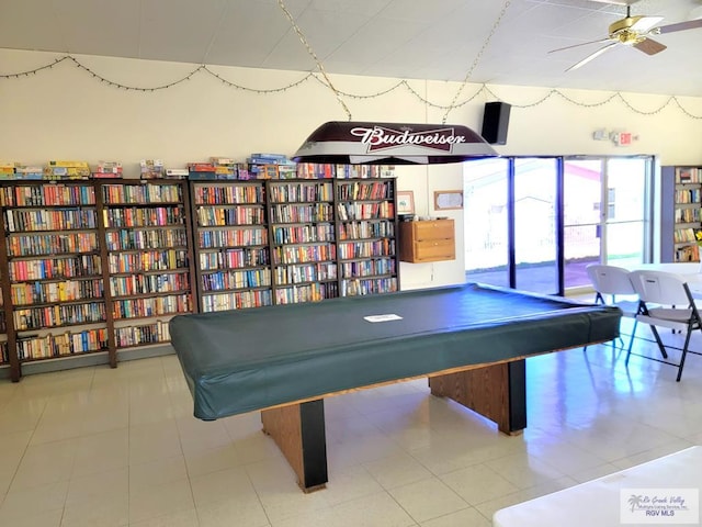 game room featuring light tile patterned floors and ceiling fan