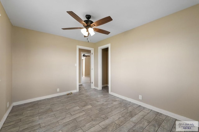 spare room with ceiling fan and light hardwood / wood-style floors