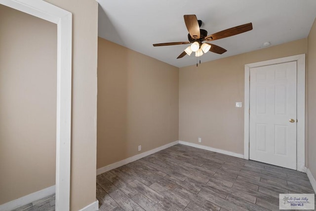 unfurnished bedroom featuring ceiling fan and hardwood / wood-style floors