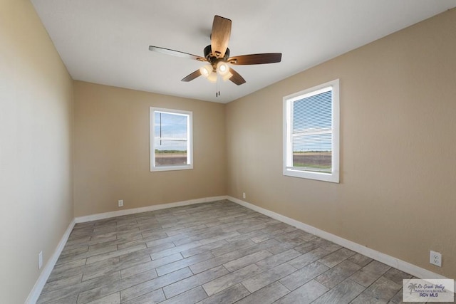 unfurnished room with ceiling fan and light hardwood / wood-style floors