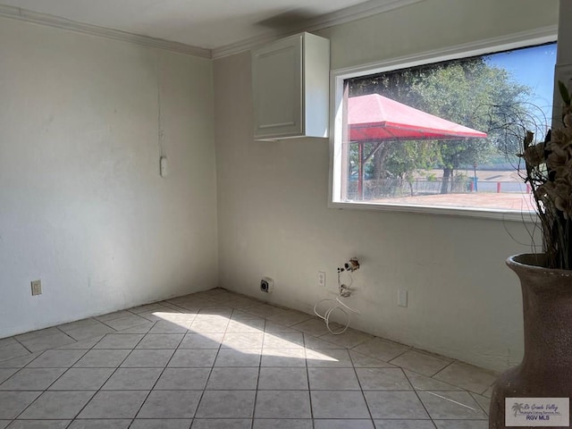 tiled empty room with ornamental molding