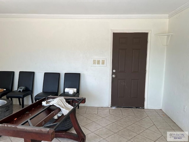 office area with crown molding and light tile patterned flooring