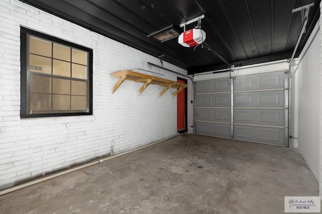 garage featuring a garage door opener