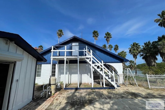 back of property with a patio area