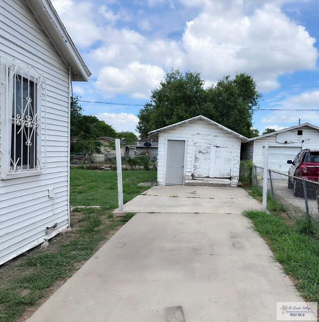 garage with a lawn