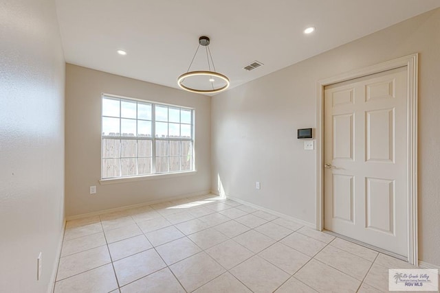 2400 Firenze St, Brownsville, TX 78520 - unfurnished room featuring light tile patterned floors and recessed lighting