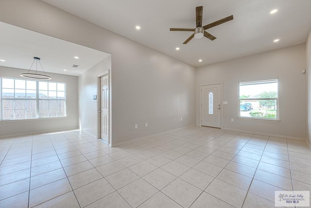 2400 Firenze St, Brownsville, TX 78520 - unfurnished room featuring healthy amount of natural light, ceiling fan, recessed lighting, and light tile patterned floors