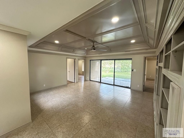 spare room featuring ceiling fan, ornamental molding, and coffered ceiling