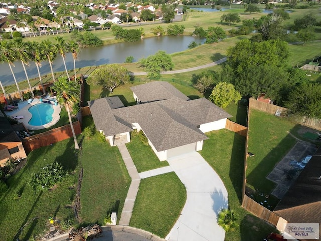 birds eye view of property featuring a water view