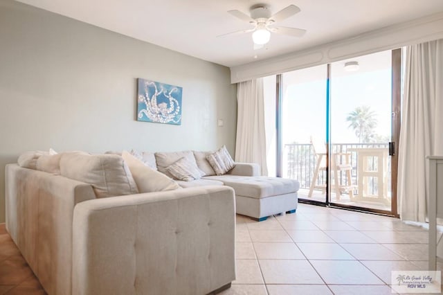 tiled living room featuring ceiling fan