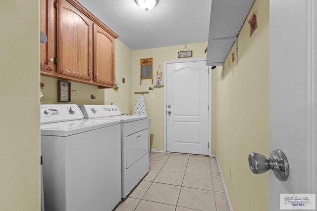 1730 Christian Cir, Harlingen, TX 78550 - laundry room featuring independent washer and dryer, cabinet space, and light tile patterned floors