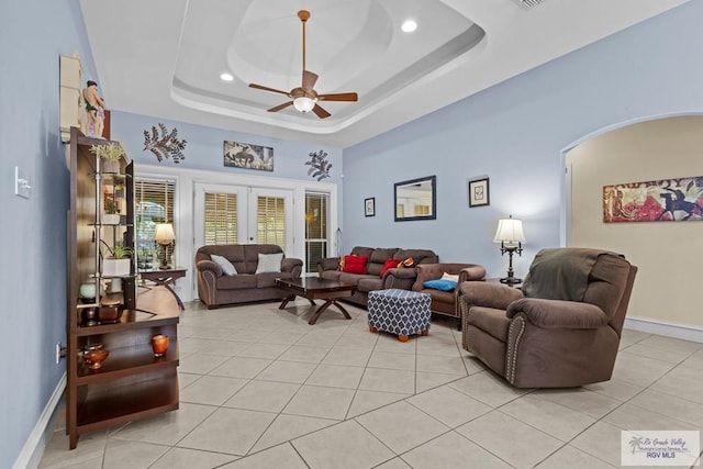 1730 Christian Cir, Harlingen, TX 78550 - living area with a ceiling fan, light tile patterned flooring, a raised ceiling, recessed lighting, and french doors