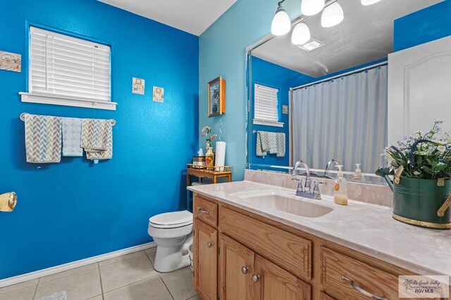 1730 Christian Cir, Harlingen, TX 78550 - bathroom with tile patterned floors, vanity, and a shower with shower curtain