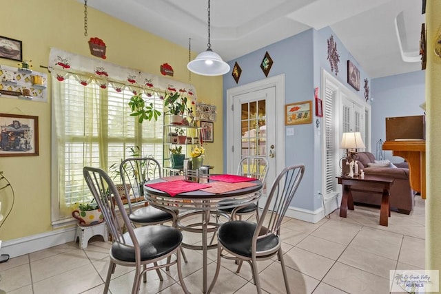 1730 Christian Cir, Harlingen, TX 78550 - dining area with plenty of natural light and light tile patterned floors
