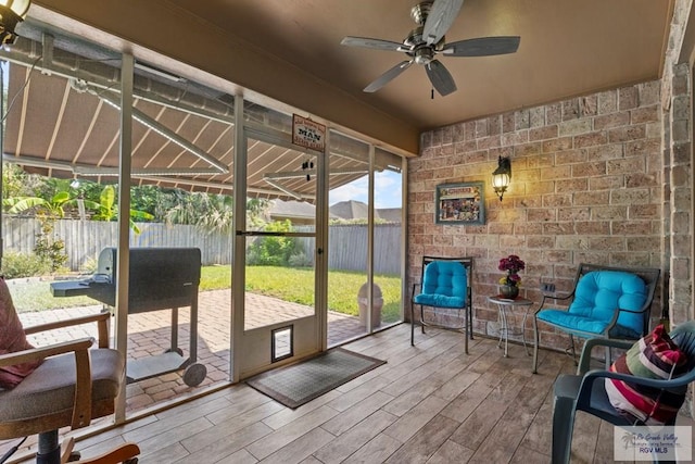 1730 Christian Cir, Harlingen, TX 78550 - sunroom featuring a ceiling fan
