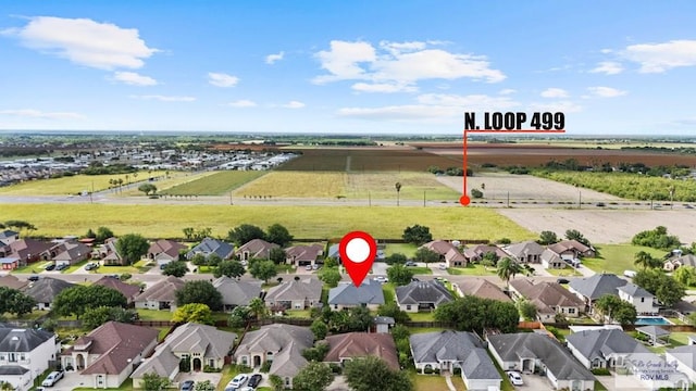 1730 Christian Cir, Harlingen, TX 78550 - aerial overview of property's location featuring nearby suburban area and rural landscape