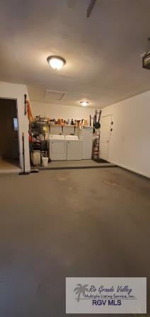 garage with separate washer and dryer