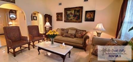 living room with light tile patterned flooring